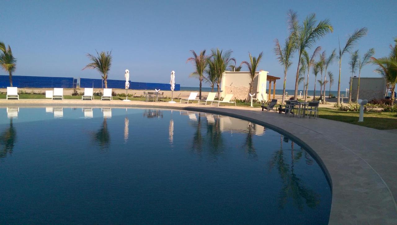 Aparthotel Playa Caracol Chame Esterno foto